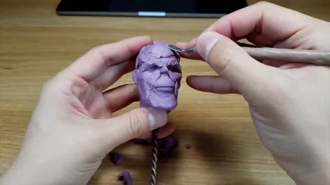 Use Purple Clay As The Facial Outline Of The Bully