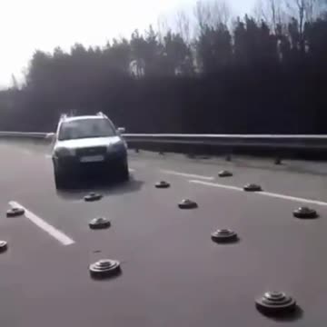 Russian Soldiers Mine Ukrainian Highway