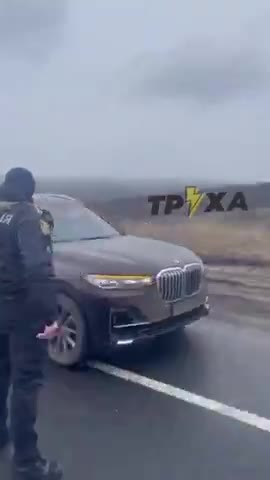 UKRAINIAN POLICE ESCORT A GROUP OF LUXURY CARS TOWARDS THE BORDER OF A EUROPEAN COUNTRY