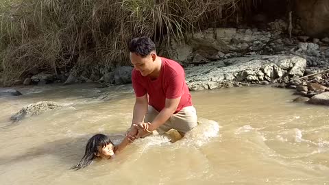 Country Kids Playing on The River