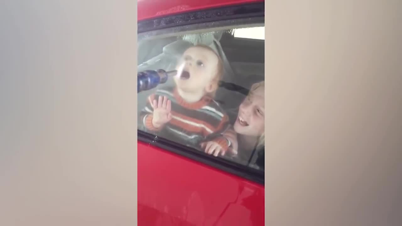 babies playing with water