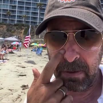 Liberal Man With Bad Attitude Has Problem With American Flags On Beach