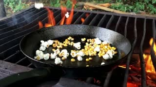 Popcorn popping in slow motion is hypnotizing to watch