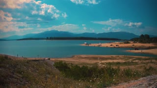 Time Lapse Video Of A Lake Used By People For Recreation