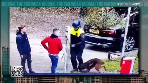 Police Dog Defends Protestors From Vaccine Police