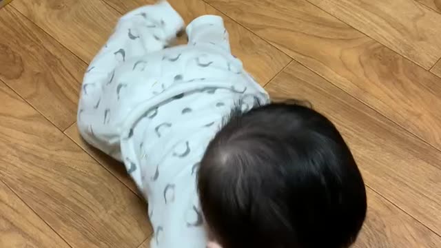 Cute baby started to crawl