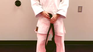 Learning to tie your new Karate Belt