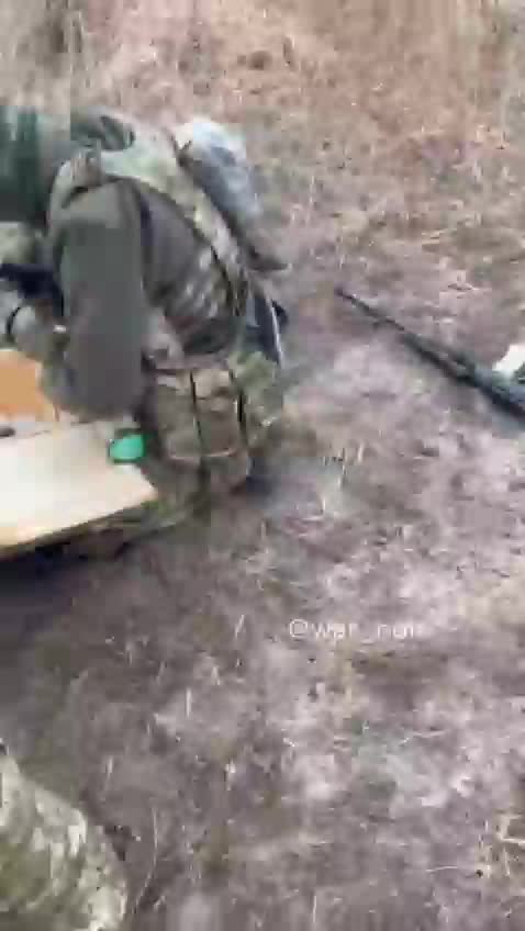 Members can be seen with AKS-74 rifle, possible UKROP UAR-15 rifle and 73mm SPG-9M