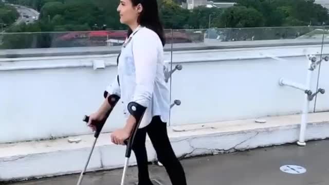 The beautiful Jessica, polio and walking with crutches