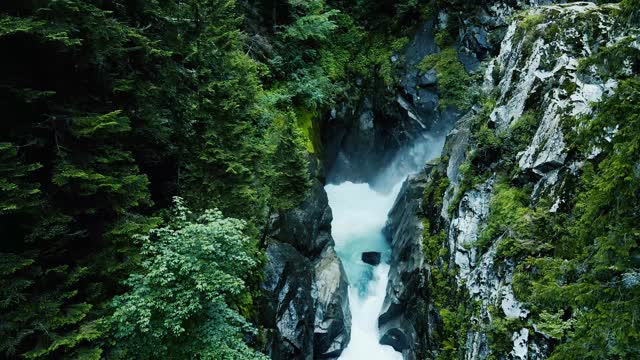 Aerial Drone Lake Waterfall Rocks Waves Water 4K