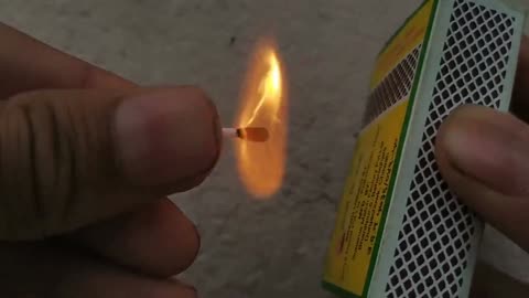 Matchstick glowing in slow motion