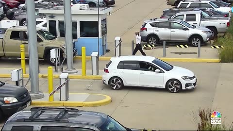 Watch: CCTV Video appears to show pilot destroy parking lot barrier with ax in Denver