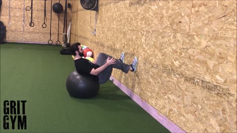 Feet to Wall Squat off Ball