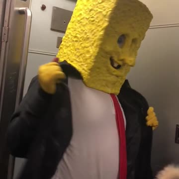 Person subway train spongebob head costume