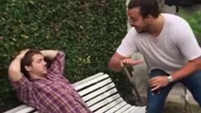Guy slaps friend