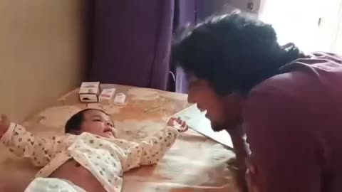 Cute Baby Playing With Her Father