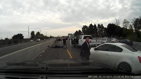 Motorcycle Merges into Median