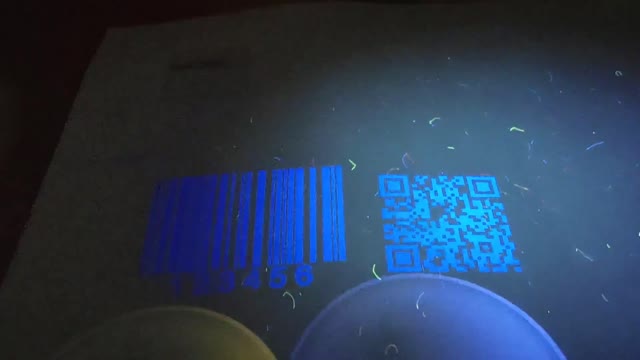 Security document example Black to Blue under UV light