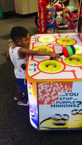 Family Fun Playing @Chuck E Cheese