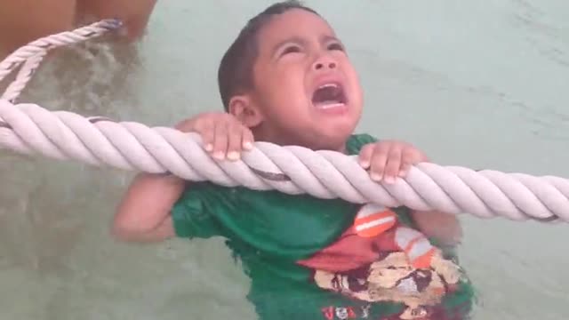 Little kid screams as he nearly drowns... not really