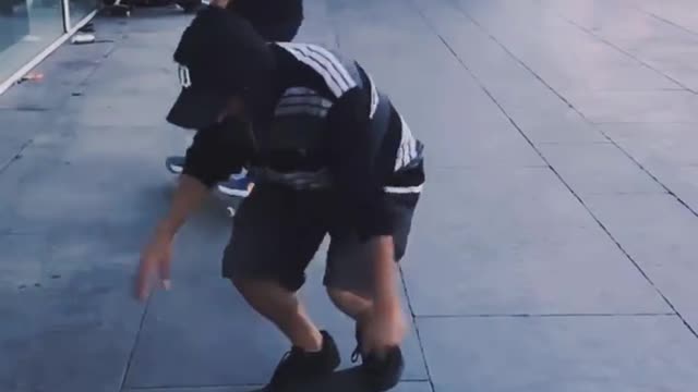 boy skateboarding on the street