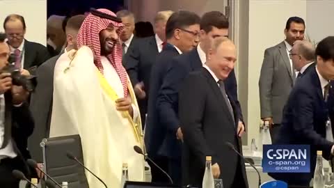 Putin and Saudi Prince Laugh and High Five