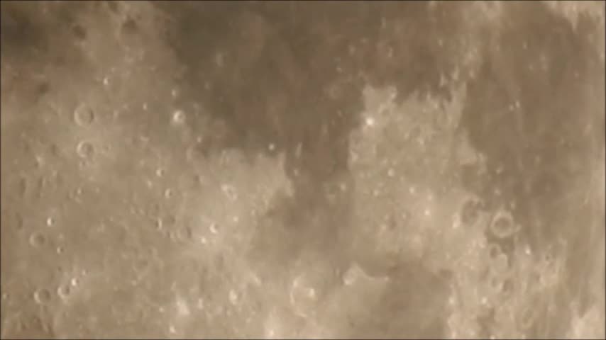 Extreme Moon Zoom Through Thin Cloud