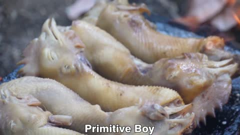 Primitive Cooking Chicken Heads