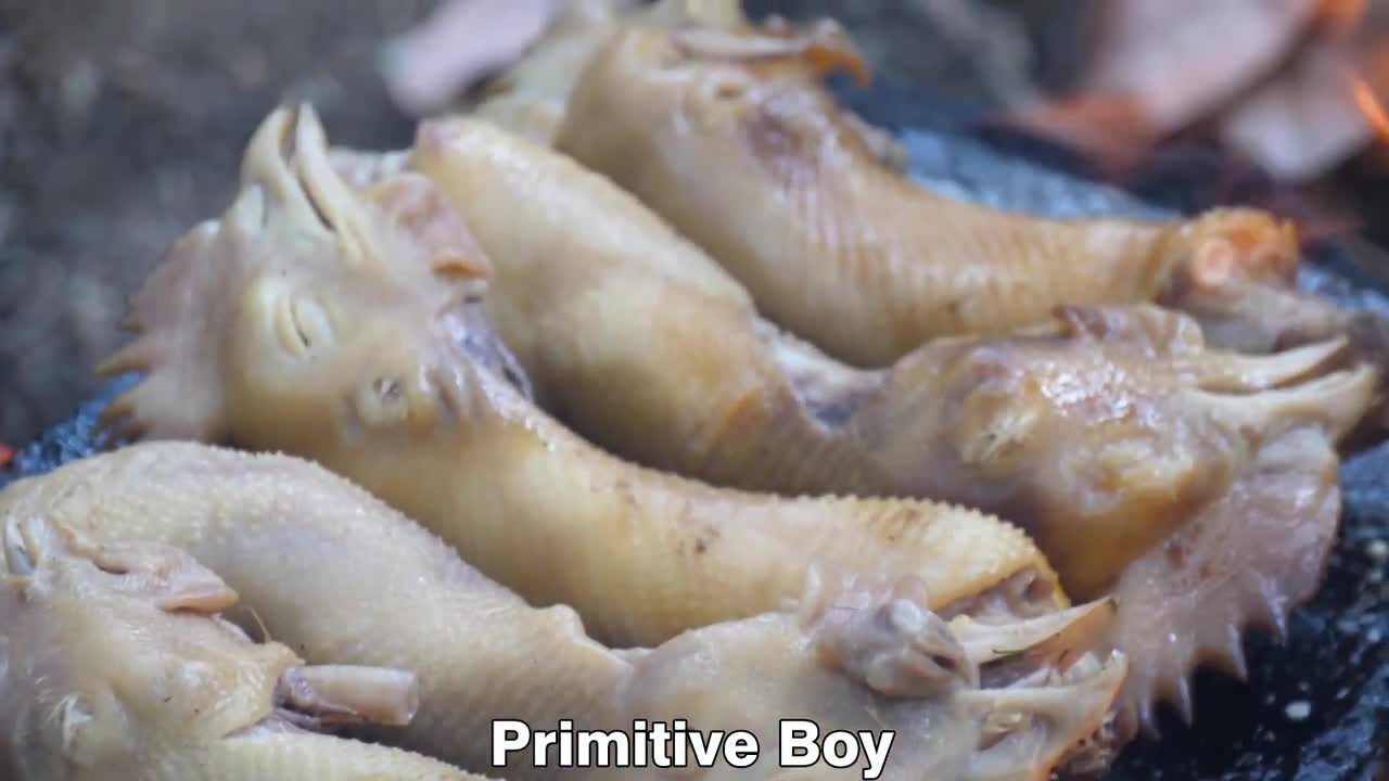 Primitive Cooking Chicken Heads