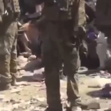 Perturbing scenes out of Kabul airport.