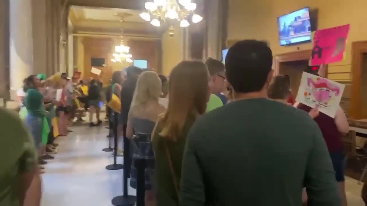 Indiana state senators have narrowly passed a near-total abortion ban during a rare weekend session: