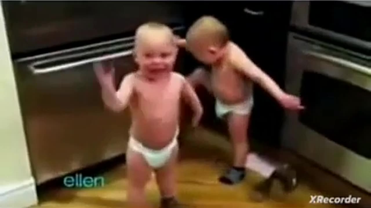 Cute babies are arguing with each other in their unique way very funny video