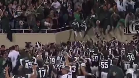 Throwback to one of the ballsiest trick plays ever. Michigan State for the win in OT.