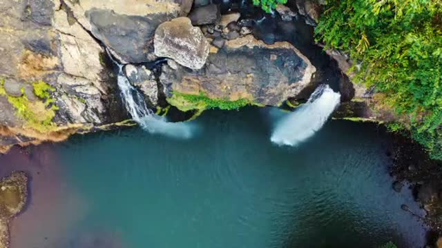 A Motion graphics Journey to Athirapally waterfall and valplarai - Nayagra of India