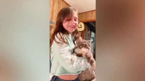 Amazing Cat is answering the girl's words.