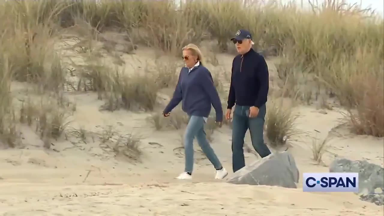 President Biden Struggles To Walk Through Sand At Beach