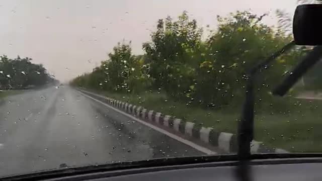 Car Driving in Raining Season