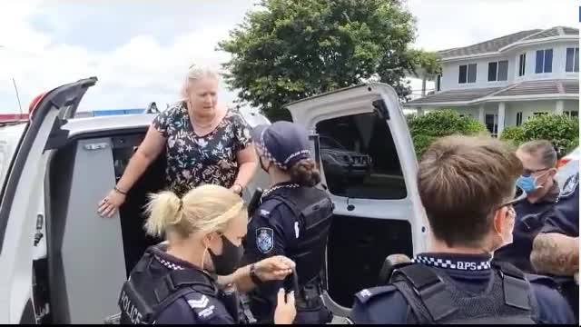 Queensland, Australia - A woman is allegedly arrested for not revealing her ‘vaccine status’