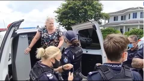 Queensland, Australia - A woman is allegedly arrested for not revealing her ‘vaccine status’