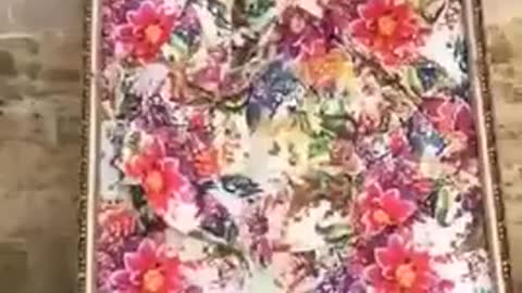 A camouflaged talented street artist