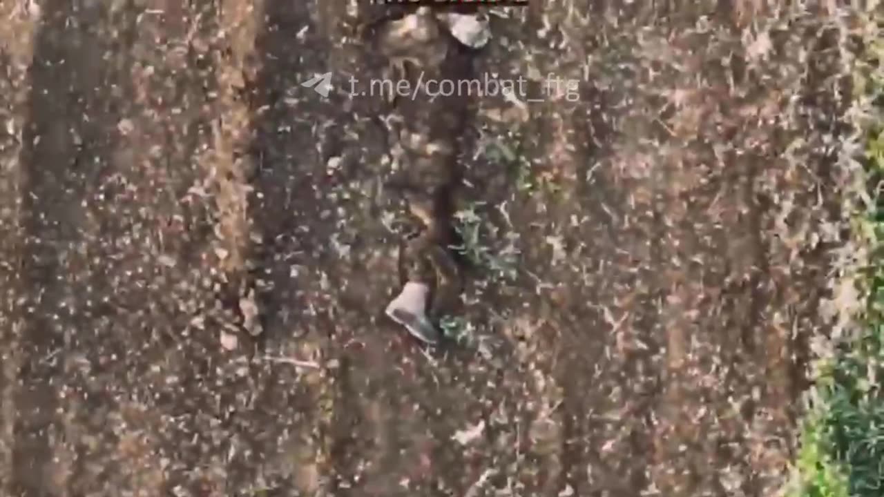 The 58th Motorized Brigade hits a couple Russians sending a body part flying.