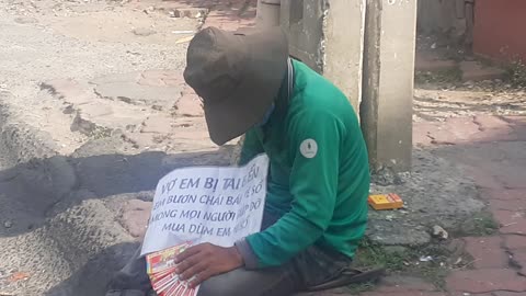 Poor beggar in vietnam.