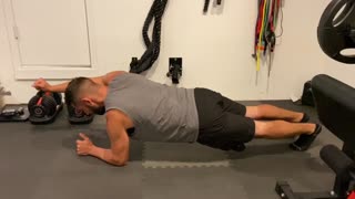 Elbow Plank Alternating Overhead Arm Lift