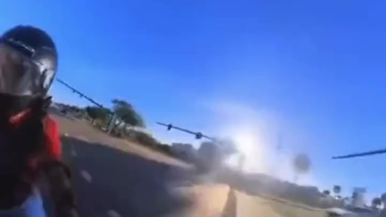 Biker Sees Car Coming