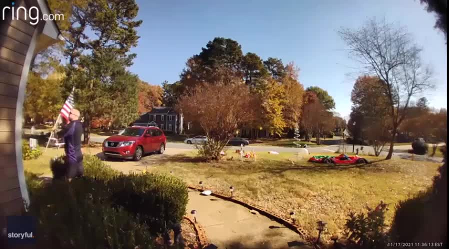 FedEx Driver hangs Fallen Flag