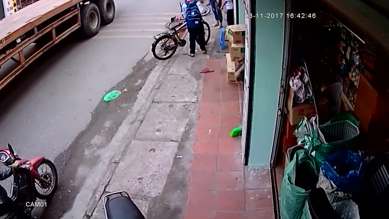 Truck Narrowly Avoids Running Over Kid On Bike