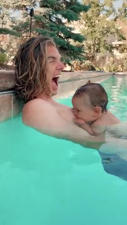 Baby tries to nurse dad