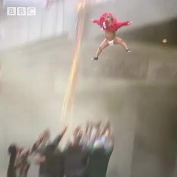 Good Samaritans Saving a Child in a Burning Building