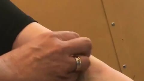 Scratching feet on train