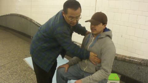 Luodong Massages Mexican Man In Subway Station